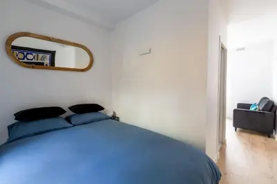 Un ou plusieurs lits dans un hébergement de l'établissement Appartement élégant rénové à Paris 14ème
