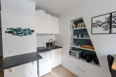 Cuisine ou kitchenette dans l'établissement Appartement élégant rénové à Paris 14ème