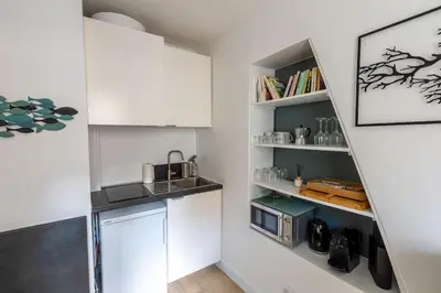 Cuisine ou kitchenette dans l'établissement Appartement élégant rénové à Paris 14ème