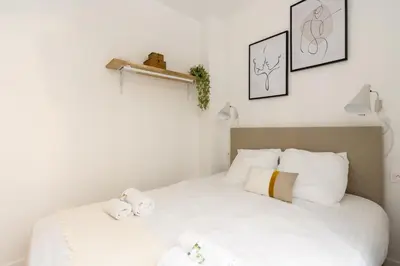 Un ou plusieurs lits dans un hébergement de l'établissement Calm and cozy flat - Central location