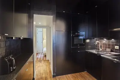 Cuisine ou kitchenette dans l'établissement Appartment St Germain des pres by Studio Prestige
