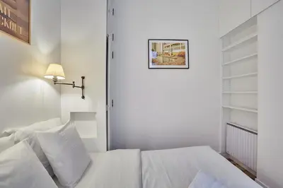 Un ou plusieurs lits dans un hébergement de l'établissement Appartment St Germain des pres by Studio Prestige