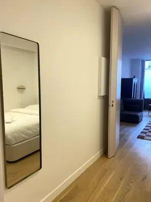 Un ou plusieurs lits dans un hébergement de l'établissement Modern parisian flat in Montparnasse area