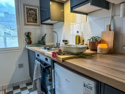 Cuisine ou kitchenette dans l'établissement Chic entre Histoire et Modernité
