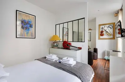 Un ou plusieurs lits dans un hébergement de l'établissement Appartement Magnifique 2 pièces, clair neuf