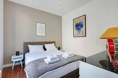 Un ou plusieurs lits dans un hébergement de l'établissement Appartement Magnifique 2 pièces, clair neuf