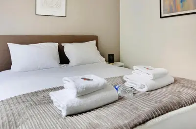 Un ou plusieurs lits dans un hébergement de l'établissement Appartement Magnifique 2 pièces, clair neuf
