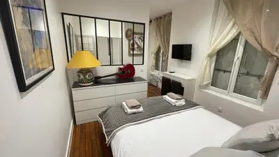 Un ou plusieurs lits dans un hébergement de l'établissement Appartement Magnifique 2 pièces, clair neuf