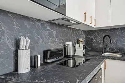 Cuisine ou kitchenette dans l'établissement Élégant Tour Eiffel