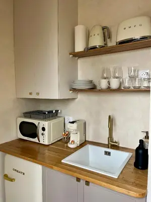Cuisine ou kitchenette dans l'établissement La vue du Marais