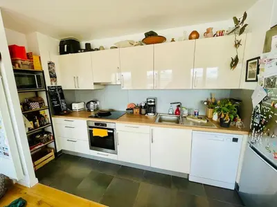 Cuisine ou kitchenette dans l'établissement Montmartre à 2 ou plus