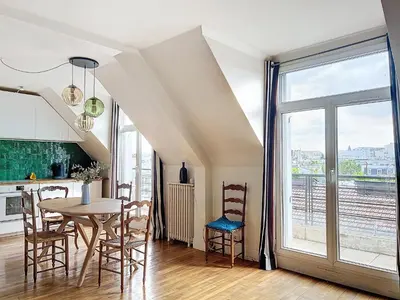 Coin salon dans l'établissement Balcony with view of Montmartre