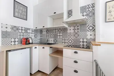 Cuisine ou kitchenette dans l'établissement République Canal St Martin Charming Apartment