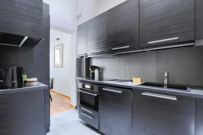 Cuisine ou kitchenette dans l'établissement Concorde Saint Honore Apartment 1BR 4P