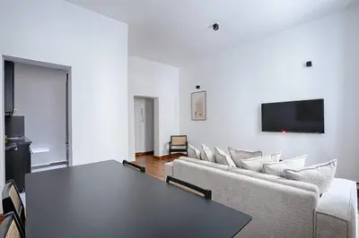 Télévision ou salle de divertissement dans l'établissement Concorde Saint Honore Apartment 1BR 4P