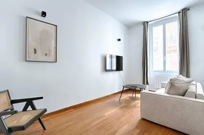 Télévision ou salle de divertissement dans l'établissement Concorde Saint Honore Apartment 1BR 4P
