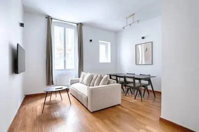 Télévision ou salle de divertissement dans l'établissement Concorde Saint Honore Apartment 1BR 4P