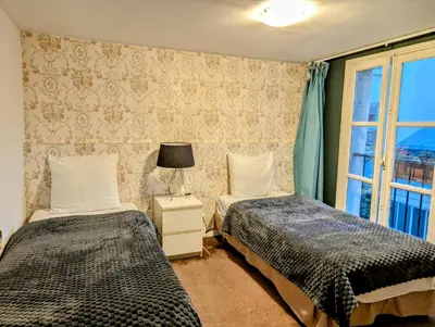 Un ou plusieurs lits dans un hébergement de l'établissement Opera Louvre HolidayApartment