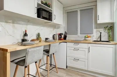 Cuisine ou kitchenette dans l'établissement Élégant studio de prestige au cœur de Paris