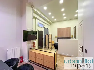 Télévision ou salle de divertissement dans l'établissement Urban Flat 05 - Beautiful Flat in Paris