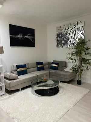 Coin salon dans l'établissement Appartement Cosy quartier Champs Élysées