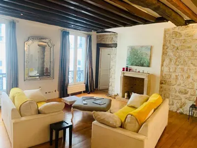 Coin salon dans l'établissement Lux Apartment Marais Temple