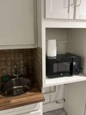 Cuisine ou kitchenette dans l'établissement Appartement proche Montparnasse et Port Royal