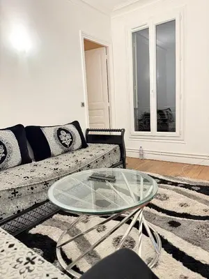 Coin salon dans l'établissement Appartement proche Montparnasse et Port Royal