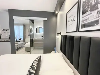 Un ou plusieurs lits dans un hébergement de l'établissement Charming Studio Paris Marais, République, Bastille
