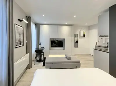 Télévision ou salle de divertissement dans l'établissement Charming Studio Paris Marais, République, Bastille