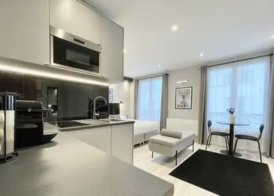 Cuisine ou kitchenette dans l'établissement Charming Studio Paris Marais, République, Bastille