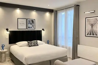 Un ou plusieurs lits dans un hébergement de l'établissement Charming Studio Paris Marais, République, Bastille
