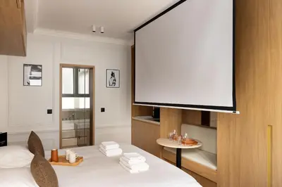 Un ou plusieurs lits dans un hébergement de l'établissement Love room avec Jacuzzi & Cinema-Gare Mont Parnasse