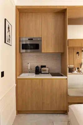 Cuisine ou kitchenette dans l'établissement Love room avec Jacuzzi & Cinema-Gare Mont Parnasse