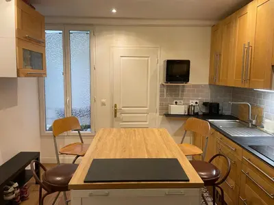 Cuisine ou kitchenette dans l'établissement Appartement au cœur de Paris