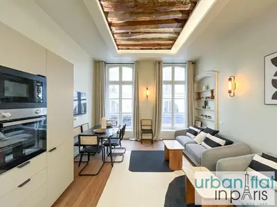 Télévision ou salle de divertissement dans l'établissement Urban Flat 188 - Stunning 4 Bedroom Flat in Paris