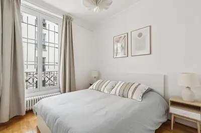 Un ou plusieurs lits dans un hébergement de l'établissement Charming Apartment 1 BR 4 persons - Opera Bourse