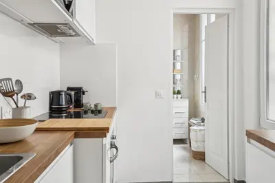 Cuisine ou kitchenette dans l'établissement Charming Apartment 1 BR 4 persons - Opera Bourse