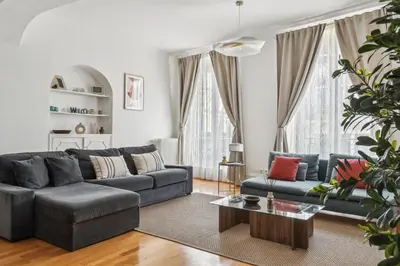 Coin salon dans l'établissement Charming Apartment 1 BR 4 persons - Opera Bourse
