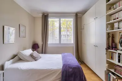 Un ou plusieurs lits dans un hébergement de l'établissement Appart calme à Buttes-Chaumont