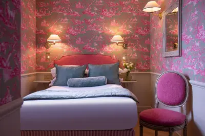 Un ou plusieurs lits dans un hébergement de l'établissement Hotel du Champ de Mars
