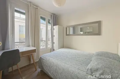 Un ou plusieurs lits dans un hébergement de l'établissement Flexliving - whole apartment - Monge