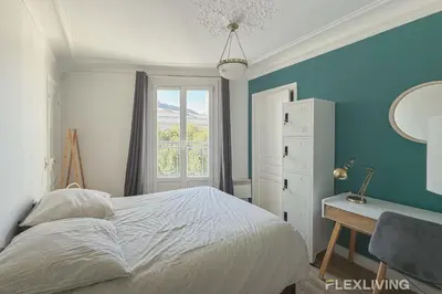 Un ou plusieurs lits dans un hébergement de l'établissement Flexliving - whole apartment - Monge