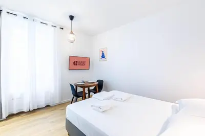 Un ou plusieurs lits dans un hébergement de l'établissement GuestReady - Charming Stay near Paris