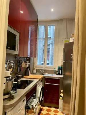 Cuisine ou kitchenette dans l'établissement Apartment Paris - Tour Eiffel - Bail Mobilité