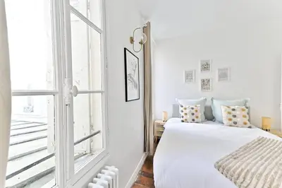 Un ou plusieurs lits dans un hébergement de l'établissement Appartement parisien spacieux #Marais #Rivoli - II