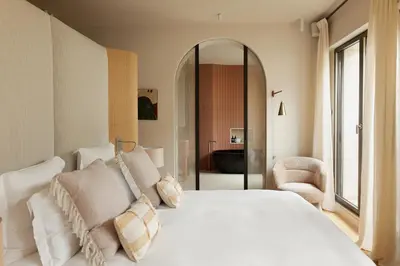 Un ou plusieurs lits dans un hébergement de l'établissement HIGHSTAY - Luxury Serviced Apartments - Eiffel