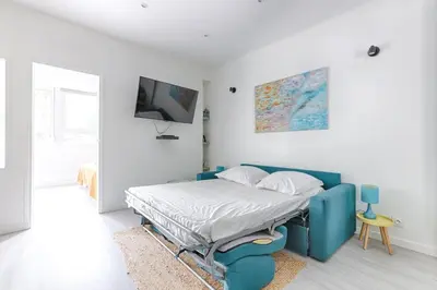 Un ou plusieurs lits dans un hébergement de l'établissement Saint Fargeau Gambetta IV Lovely Apartment 4P 1BR