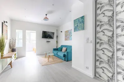 Télévision ou salle de divertissement dans l'établissement Saint Fargeau Gambetta IV Lovely Apartment 4P 1BR