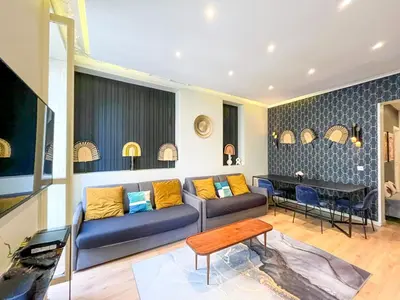 Coin salon dans l'établissement Urban Flat 61 - Pretty 3 Bedrooms in Center of Paris
